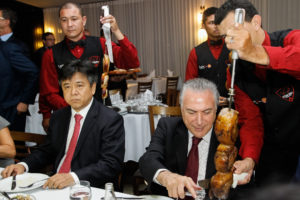 <p>China’s ambassador Li Jinzhang sits next to Brazilian president Michel Temer at a dinner intended to reassure beef importers in the wake of a huge safety scandal (image: <a href="https://www.flickr.com/photos/palaciodoplanalto/32694980184/in/album-72157678254561453/" target="_blank" rel="noopener">flickr </a>)</p>
