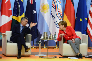 <p>Argentine president Mauricio Macri and German chancellor Angela Merkel meet at the 2017 G20 summit in Hamburg, Germany (image: <a href="https://commons.wikimedia.org/wiki/File:Macri_%26_Merkel_G20_2017_summit.jpg" target="_blank" rel="noopener">Casa Rosada </a>).</p>