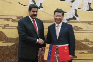 <p>President Nicolás Maduro and Chinese leader Xi Jinping pictured in 2013. Despite huge loans to the South American country, China has remained tight-lipped on Venezuela&#8217;s crisis (image: <a href="http://mppre.gob.ve/content/uploads/2018/05/china-venezuela.jpg">Ministry of Foreign Affairs of Venezuela</a>)</p>