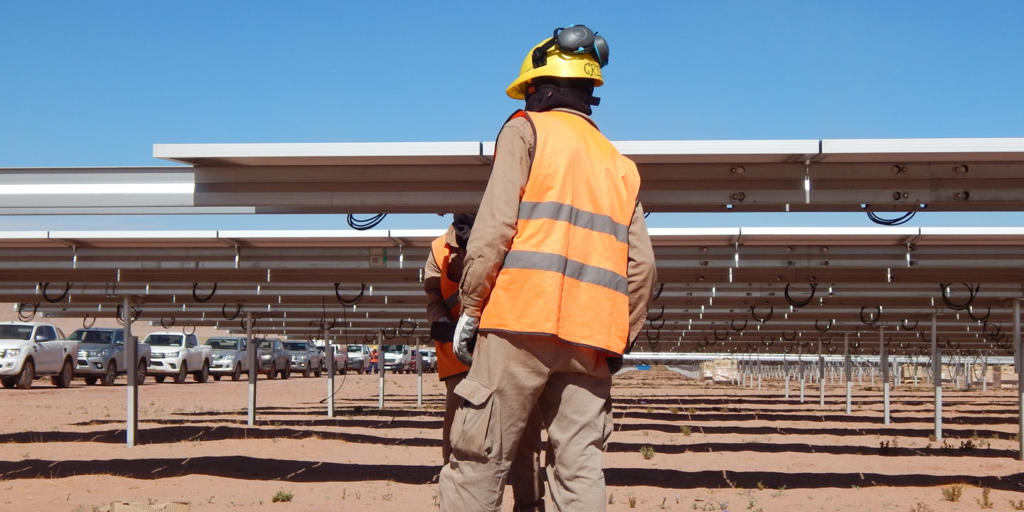 <p>A worker at the Cauchari solar plant in Argentina&#8217;s Jujuy province, one of the major renewables projects halted by the coronavirus (image: Fermín Koop)</p>