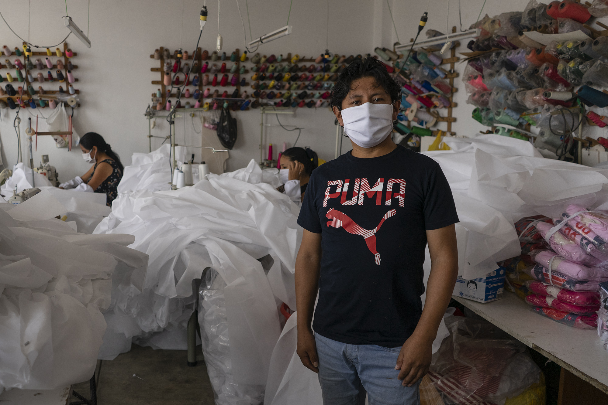 a textile worker in a workshop in Lima, Peru