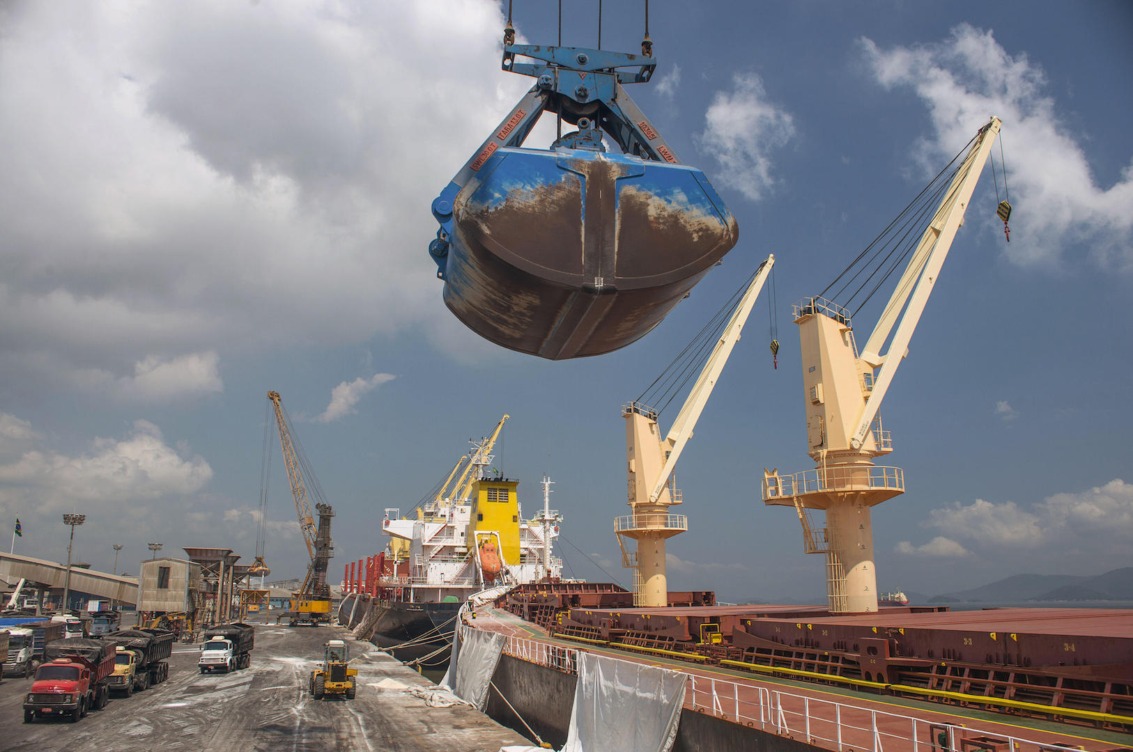 A crane unloads fertiliser at the port of Paranaguá, Southern Brazil