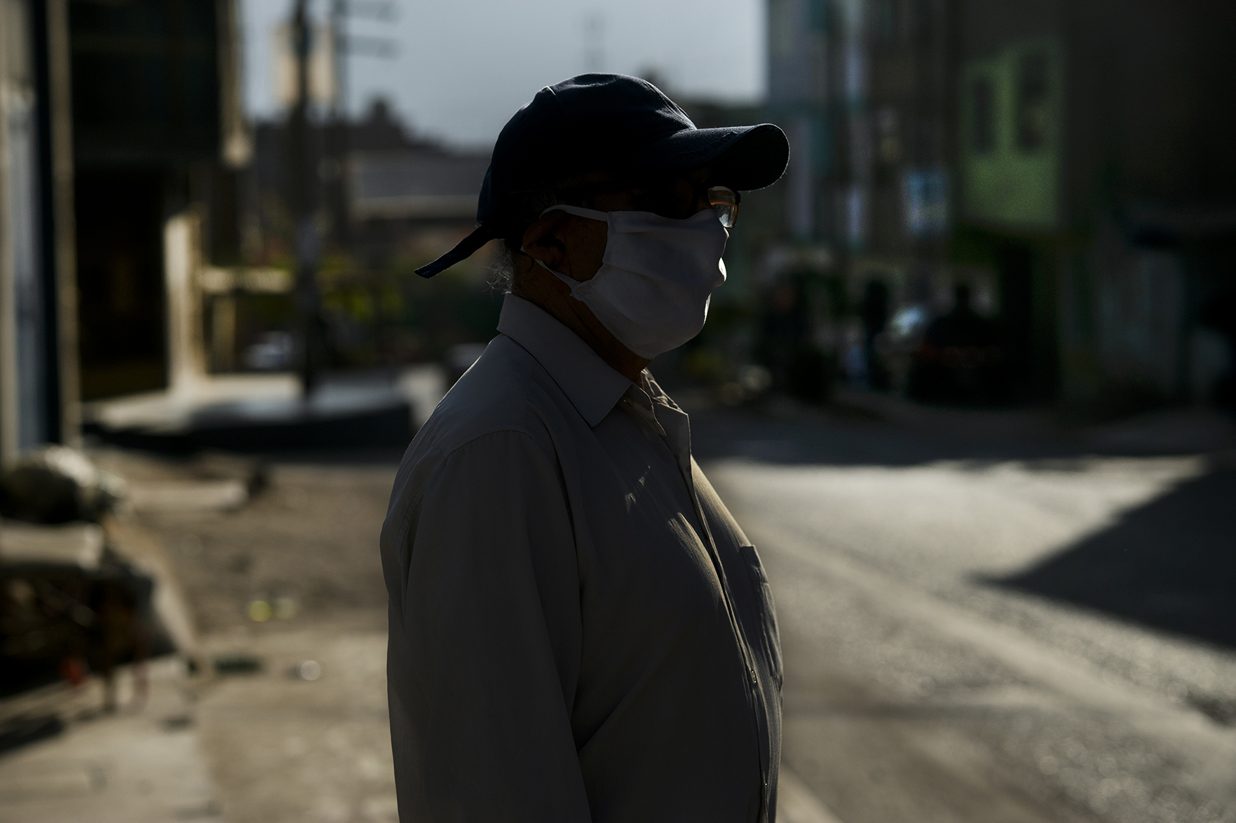 a textile worker wearing a face mask in Lima, Peru
