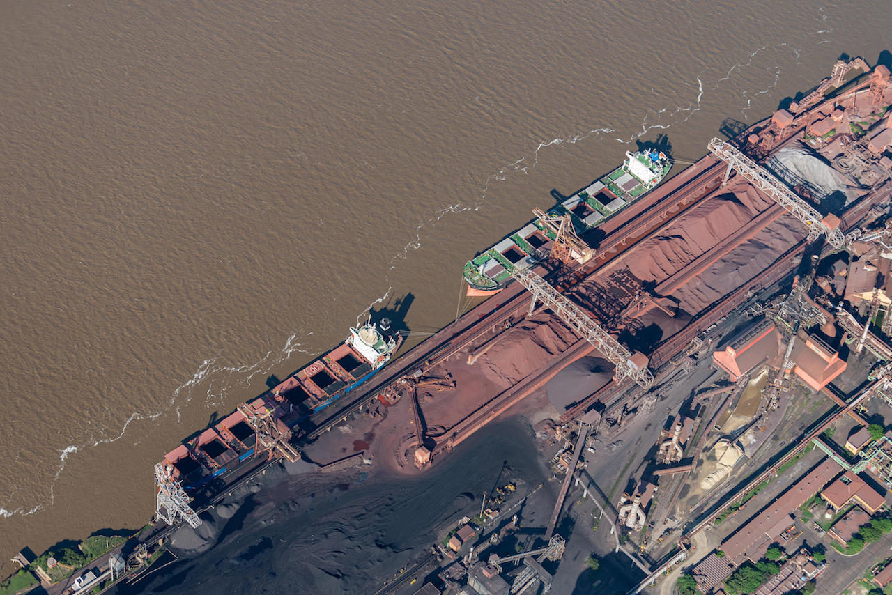 Aerial view of cargo vessels load at San Nicolás de los Arroyos, an important stop along the Paraná–Paraguay waterway