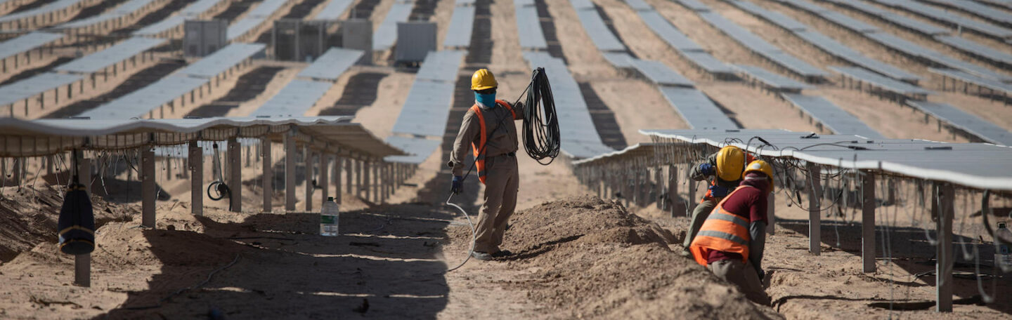 workers at a Solar photovoltaic plants in Cafayate, Salta province, Argentina