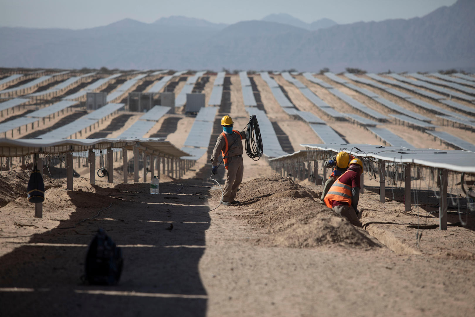 workers at a Solar photovoltaic plants in Cafayate, Salta province, Argentina