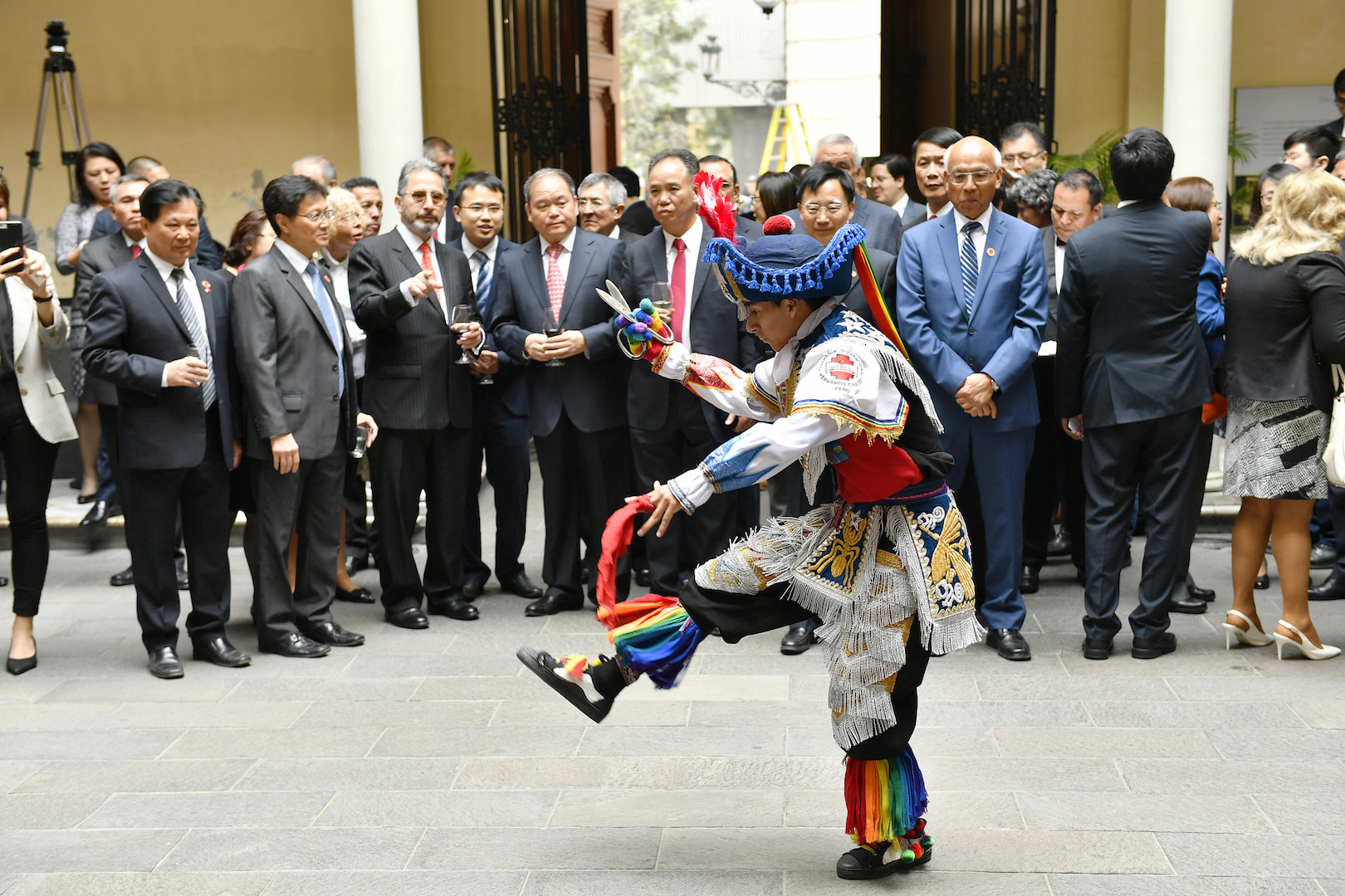 a dancer in a ceremony at the Chinese embassy in Lima commemorates 170 years of Chinese immigration in Peru