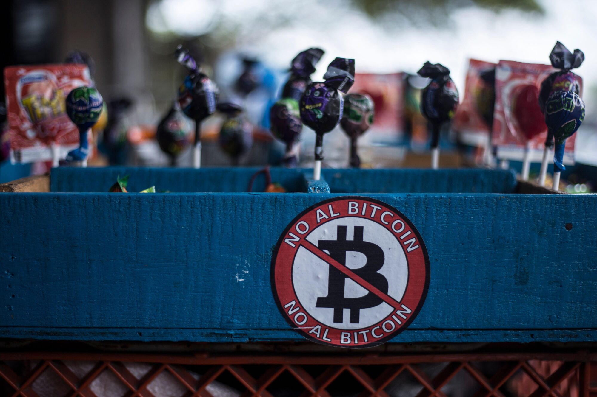 Candies in a market in El Salvador, in a container that says "No to Bitcoin".