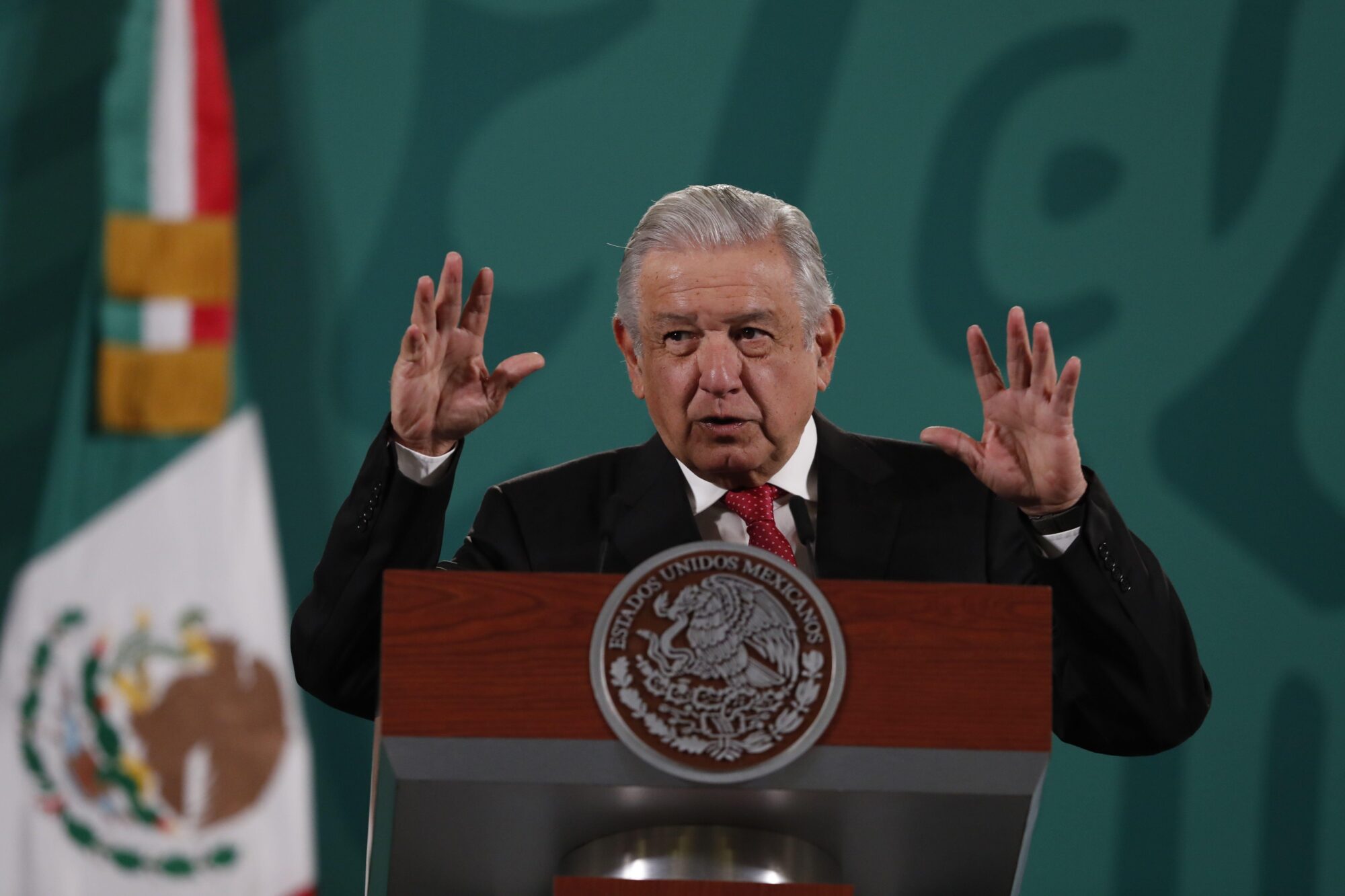 Mexican President Andrés Manuel López Obrador speaks at a lectern.
