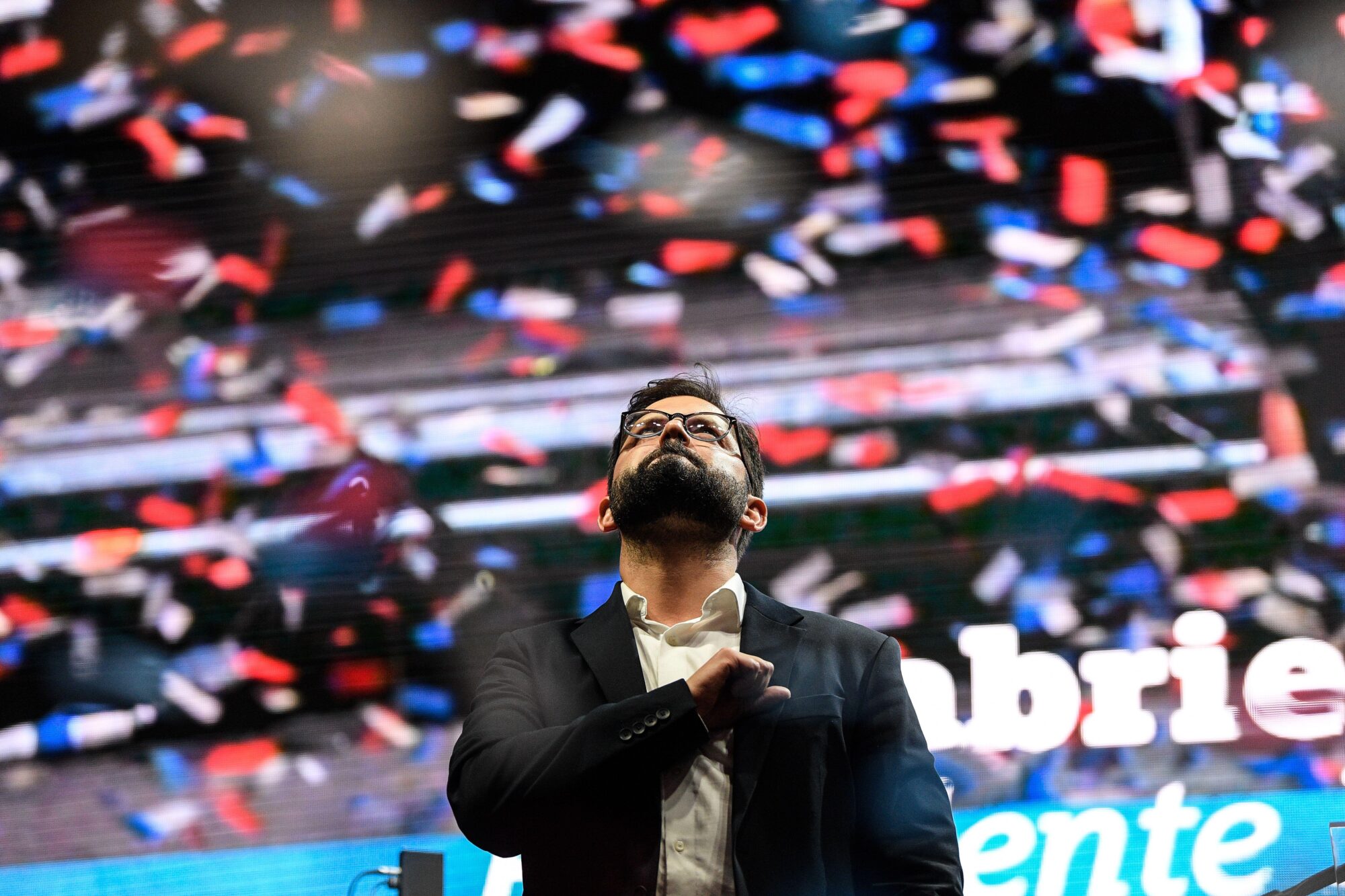 <p>Chile&#8217;s president-elect Gabriel Boric celebrates at a public event in Santiago, after winning the 19 December election. The young left-wing candidate&#8217;s moves on the environment and regional relations in his first year in office are likely to be one of the most closely watched stories in Latin America in 2022. (Image: Jorge Villegas / Alamy)</p>