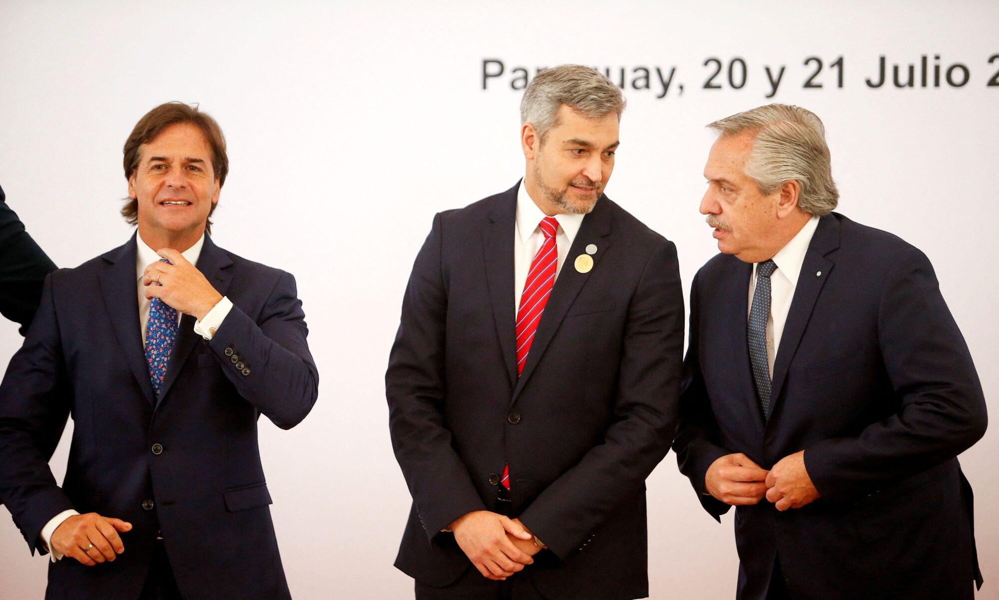 <p>Uruguay’s president Luis Lacalle Pou (left) at the Mercosur summit in Asunción, 21 July. His desire to seek a free trade deal with China has caused tensions, with Mario Abdo of Paraguay (centre) and Alberto Fernández of Argentina (right) calling for regional unity in response (Image: Cesar Olmedo / Alamy)</p>