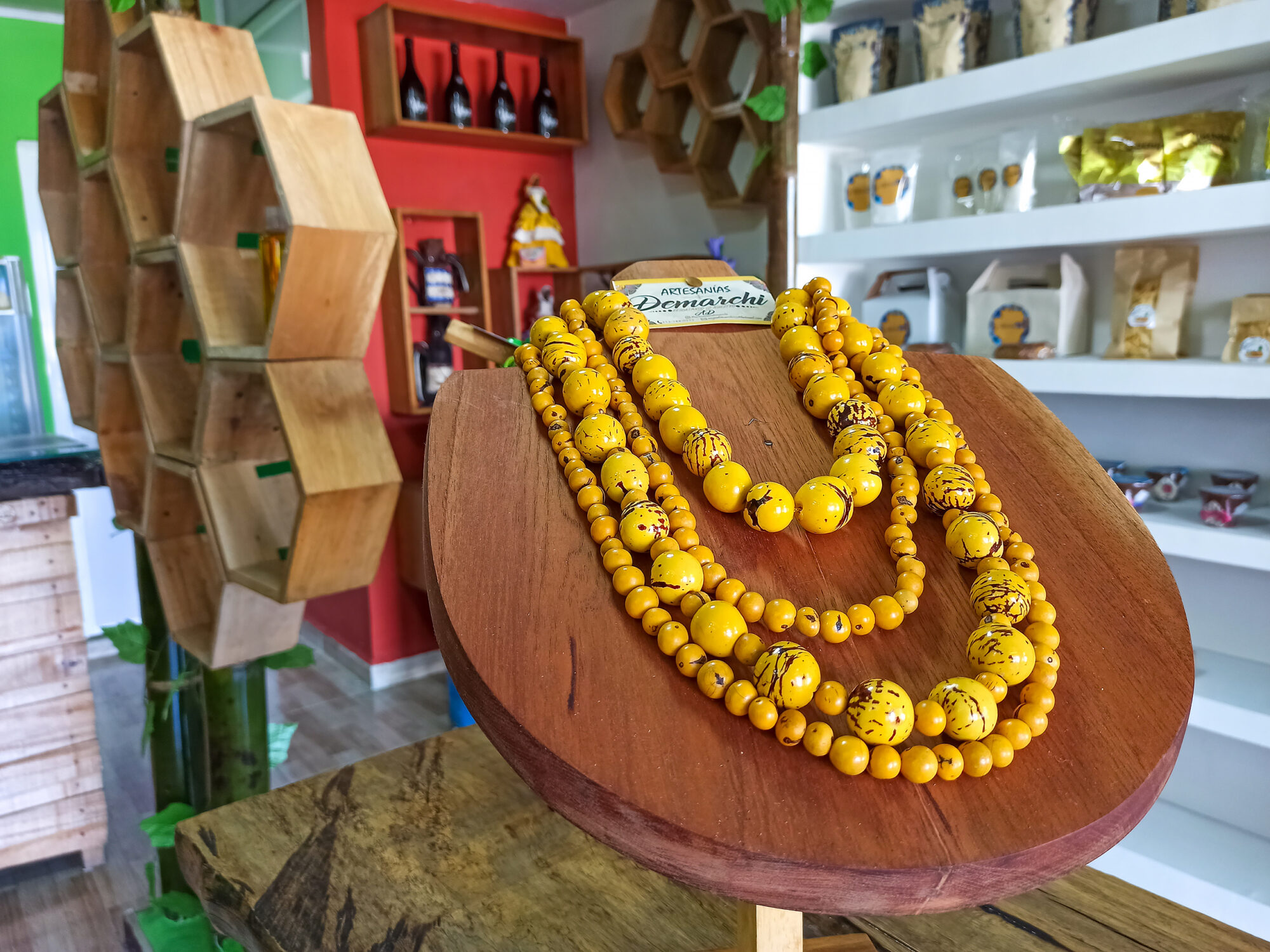 yellow layered beaded necklace on display