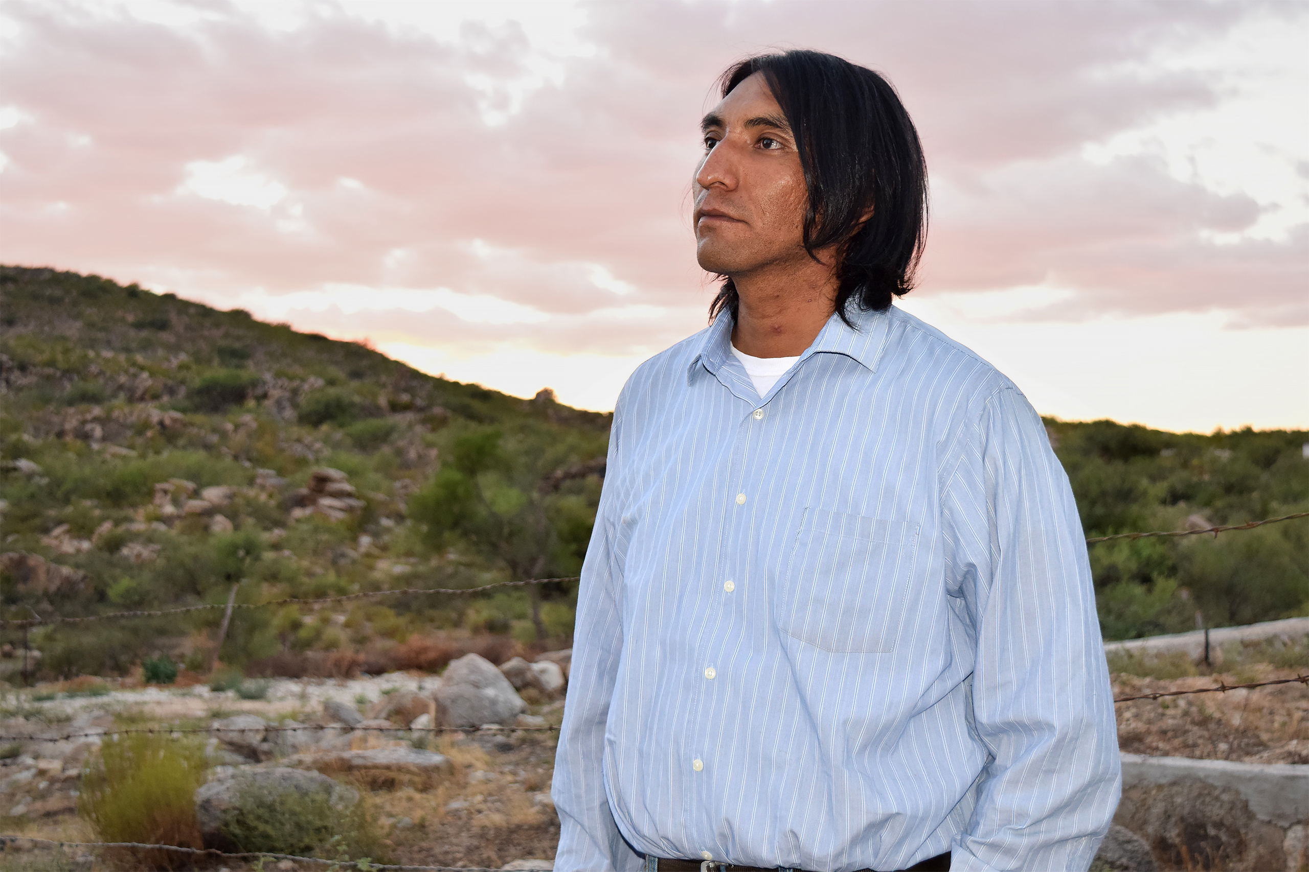 Matias Valenzuela, an Indigenous leader of the Tohono O'odham people, poses