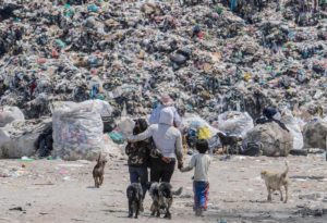 waste pickers in front of the garbage dump in Mexico city