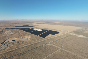 aerial image of a solar plant in the middle of the desert