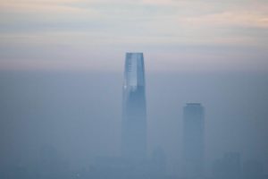 Skyscraper surrounded by smog