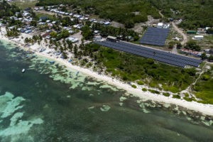 aerial view of solar plant near coast