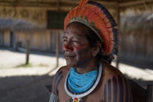 <p>Cacique Bepdjo Mekrãgnotire, an Indigenous leader in the Kayapó community, which is fighting against illegal mining in the Baú territory in Brazil’s Pará state. A Global Witness report found that in 2022, one in five killings of environmental defenders recorded globally happened in the Amazon. (Image: Karina Iliescu / Global Witness)</p>