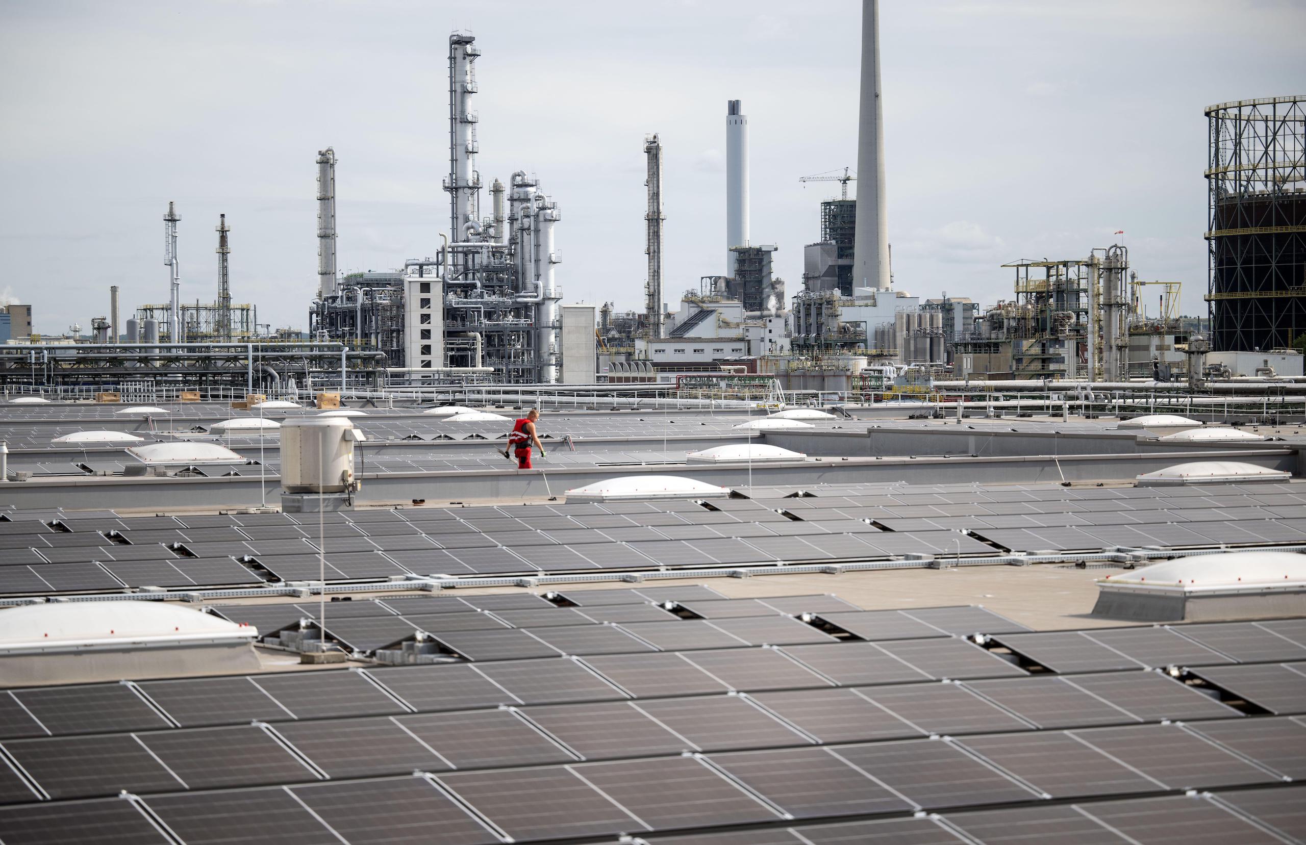 A staff working through a rooftop solar plant