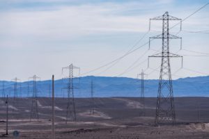 Electricity pylons in a desert